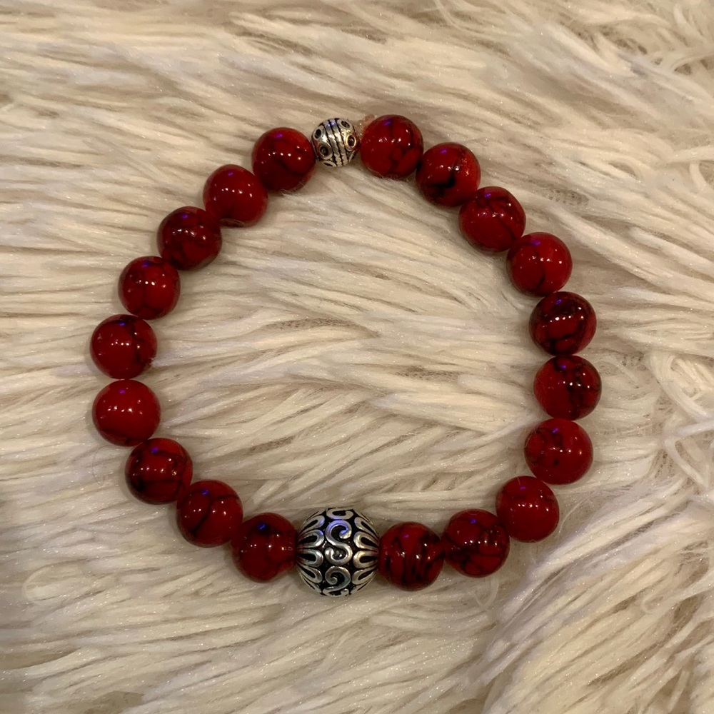 Men’s red beads w/silver filigree accent bracelet.